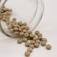 Perles de bois pétrifié naturel - rondelle (Paquet de 50)