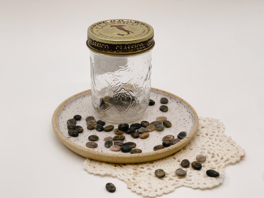 Perles de Sunstone noirs - puces (Paquet de 50)